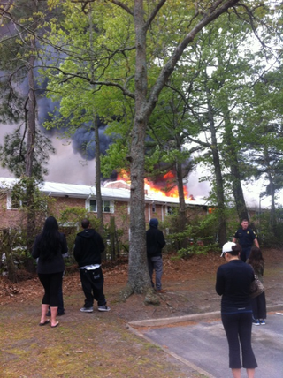 Illustration for article titled F-18 Crashes into Apartment Building and Explodes (Update: No Deaths)